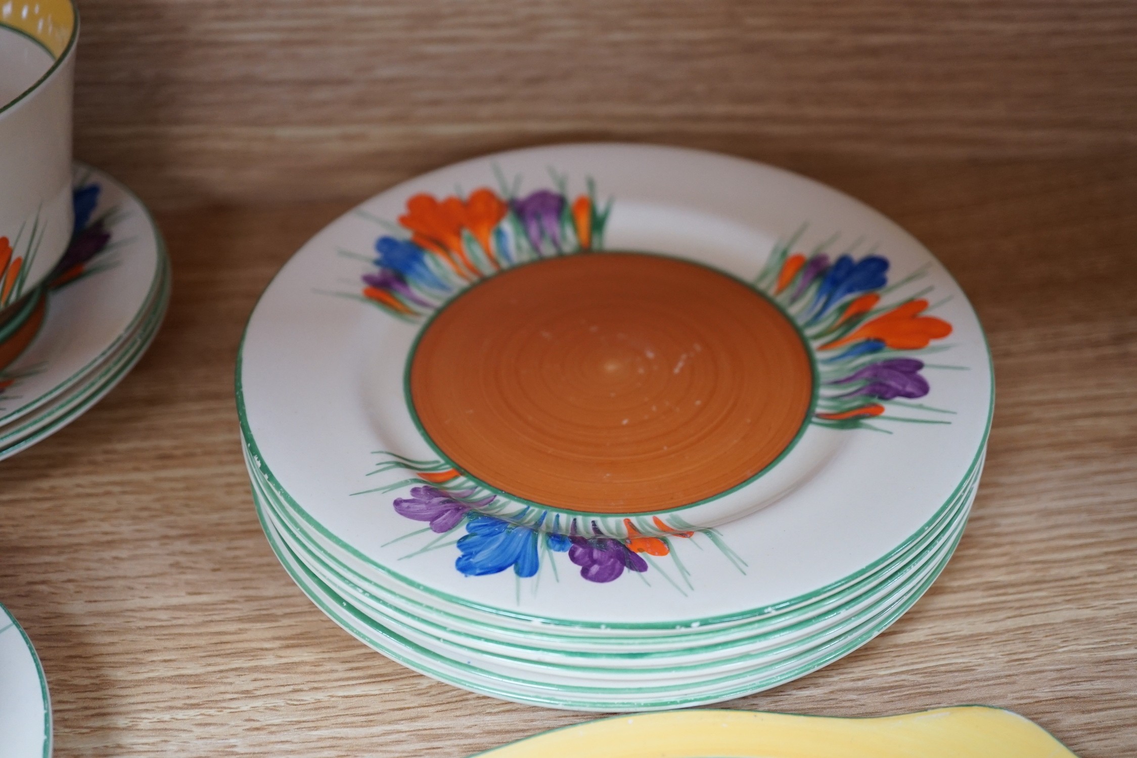 A Clarice Cliff seventeen piece Autumn Crocus part teaset, including a preserve jar and cover